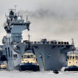 Početkom svibnja je HMS Ocean prošao Thames Barrier na prilasku sidrištu Greenwich, nedaleko olimpijskih borilišta.